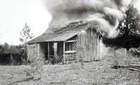 Burning_residence_Rosewood_Massacre_1923.jpeg